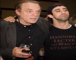 Brad Dourif consuming alcohol